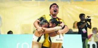 University of Santo Tomas celebrates its UAAP Season 88 women’s beach volleyball championship. UAAP PHOTO