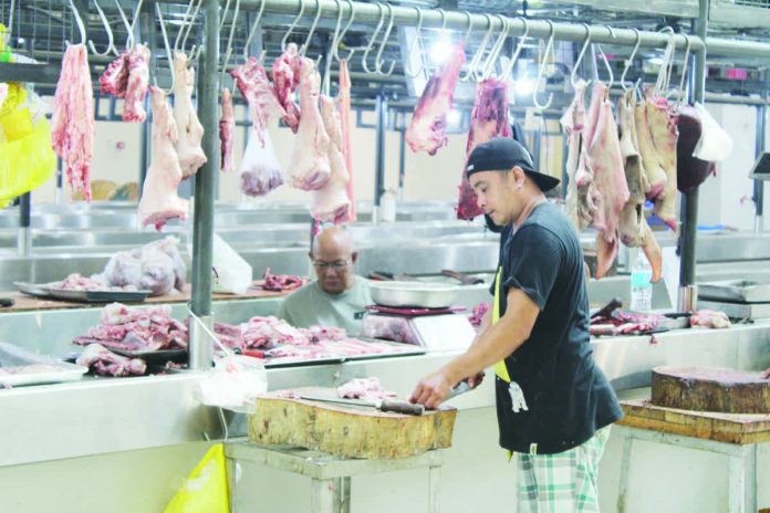 Under a new Department of Agriculture administrative circular, pork liempo is capped at P370 per kilogram while kasim and pigue are priced at P330 per kilogram. AJ PALCULLO/PN