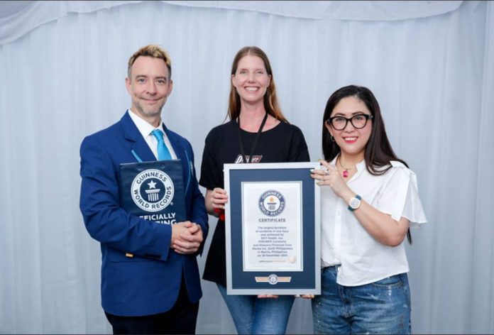 watsons-ph1 Watsons Philippines and Premiere Condoms successfully set a new Guinness World Records™ title for the Largest Donation of Condoms in One Hour at the Protected & Proud Concert. (L–R: Justin Patterson, Official Adjudicator, Guinness World Records; Denise van Dijk, President and CEO, DKT Health Inc.; Joweeh Liao, Director for Health Business Unit, Finance, Property, and Store Development, Watsons Philippines)
