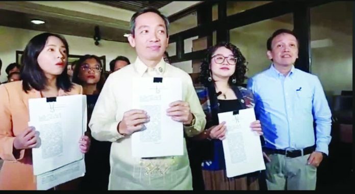 2nd_impeach_resized_compressed A second impeachment complaint is filed against President Ferdinand Marcos Jr. at the House of Representatives on Jan. 22, 2026. Bagong Alyansang Makabayan chairman Renato Reyes and former ACT Teachers party-list representative France Castro accused Marcos of betrayal of public trust due to his non veto of the unprogrammed appropriations in the 2026 budget. SCREENGRAB FROM FACEBOOK