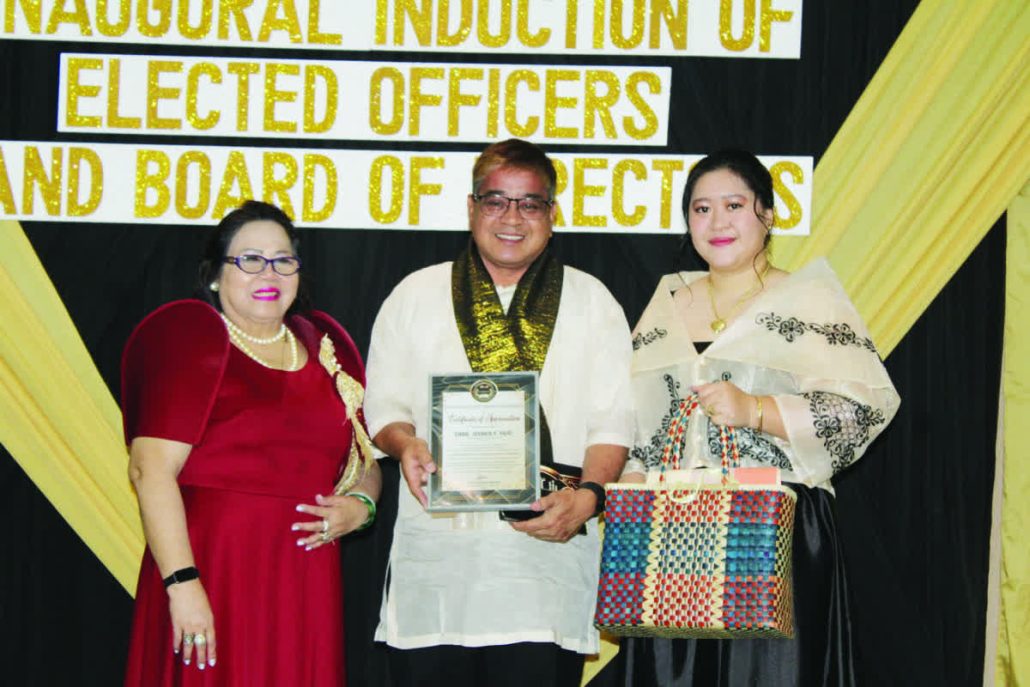 Engr. Joemer F. Fayo (center), OIC of Environmental Occupational Health-Department of Health Region 6, receives a certificate of appreciation from Panay Association of Registered Embalmers and Mortuary Owners.