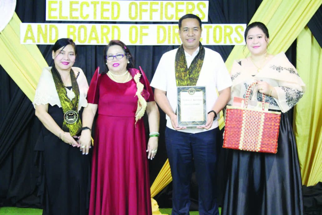 Department of Social Welfare and Development Region 6's OIC Regional Director Joselito G. Estember (second from right), is one of the guests during the inaugural induction ceremony of PAREMO officers and board of directors