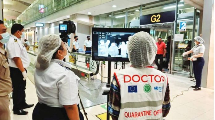 Asia Thai health officials wearing protective masks monitoring passengers from international flights arriving at Suvarnabhumi Airport. EPA
