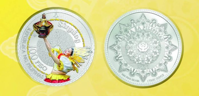 BSP coins copy_compressed The first 100-peso Philippine Festival Commemorative coin launched by the Bangko Sentral ng Pilipinas features Cebu's popular Sinulog Festival. The coin shows a female dancer holding an image of the Sto. Niño. BSP PHOTO