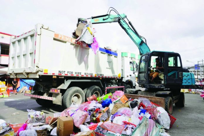 Around 60 compactors, garbage trucks, and other heavy equipment were deployed early Thursday morning, January 1, for immediate cleanup operations across Bacolod City, resulting in the collection of nearly 55,000 tons of garbage. MAYOR GREG GASATAYA FB PHOTO