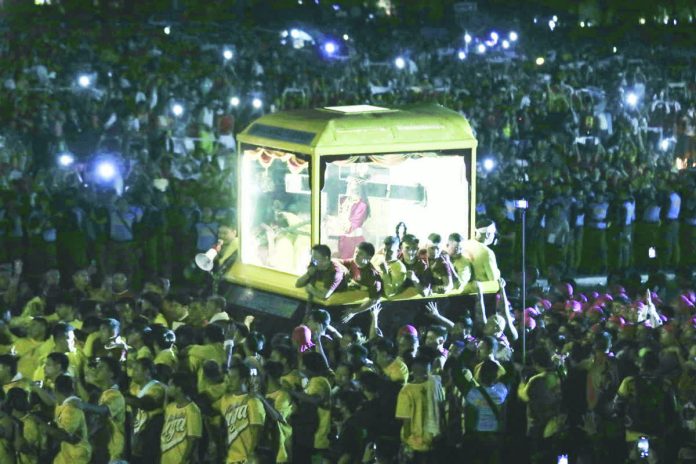 Bishop_calls_copy_resized_compressed Thousands of devotees join the Traslacion (grand procession), the highlight of the Feast of Jesus Nazareno, from the Quirino Grandstand back to Quiapo Church at around 3:58 a.m. on Friday, Jan. 9, 2026. PNA