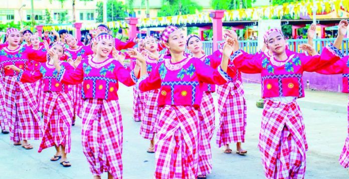 Capiz_Binuligay_Festival_copy_resized_compressed Performers in colorful costumes took part in a street dance during a previous Binuligay Festival in Jamindan, Capiz, celebrating the town’s culture and spirit of cooperation. CAPIZ TOURISM AND CULTURAL AFFAIRS PHOTO