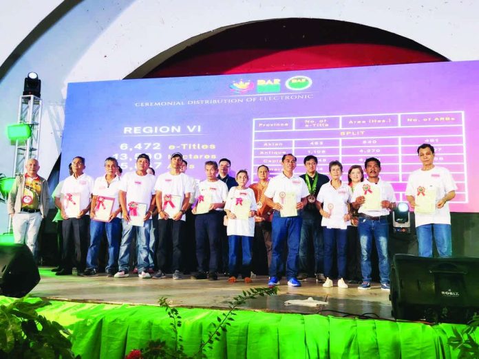 Guimarasnon agrarian reform beneficiaries received their Certificates of Condonation with Release of Mortgage (CoCROM) from the Department of Agrarian Reform (DAR) during a distribution ceremony on January 12. NELJOY N. GALIGAO/PN