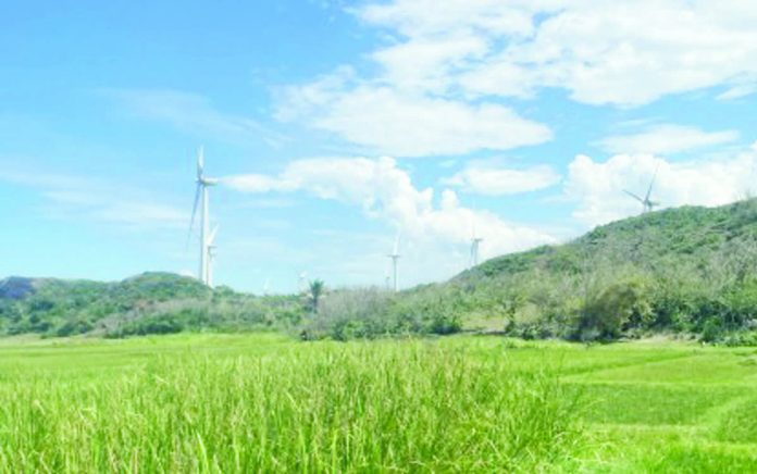 DOE_clean_energy_resized_compressed Renewable energy got further boost in 2025 as the Department of Energy conducted two green energy auctions to bolster clean energy capacity in the country. Photo shows windmills in Burgos, Ilocos Norte. PNA FILE PHOTO BY LEILANIE ADRIANO