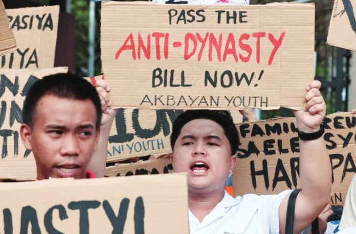 Dynasty Progressive group Akbayan Youth stages a protest at the House of Representatives in Quezon City on January 27, 2026, calling on Congress to fulfill its long-delayed constitutional duty to pass an Anti-Political Dynasty Law. INQUIRER PHOTO / GRIG C. MONTEGRANDE