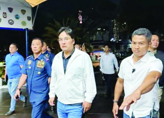 Ex-senator_copy_resized_compressed Former senator Ramon “Bong” Revilla arrives at Camp Crame on Monday evening to surrender. He has a pending warrant issued by the Sandiganbayan for charges of malversation and falsification of public documents over a P92.8-M flood control project in Pandi, Bulacan. PHILIPPINE STAR PH PHOTO