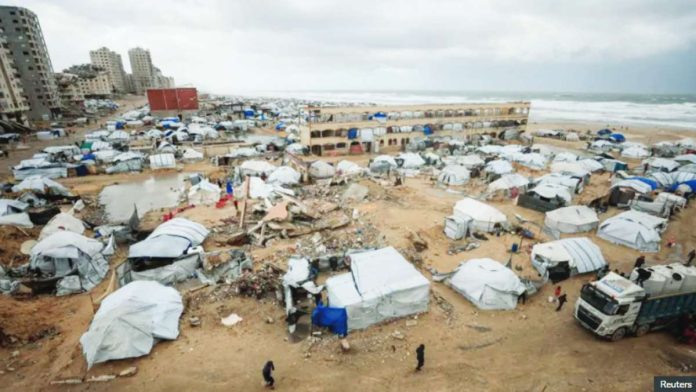 These tents are used by displaced Palestinians on a beach during a windy winter day in Gaza City. REUTERS