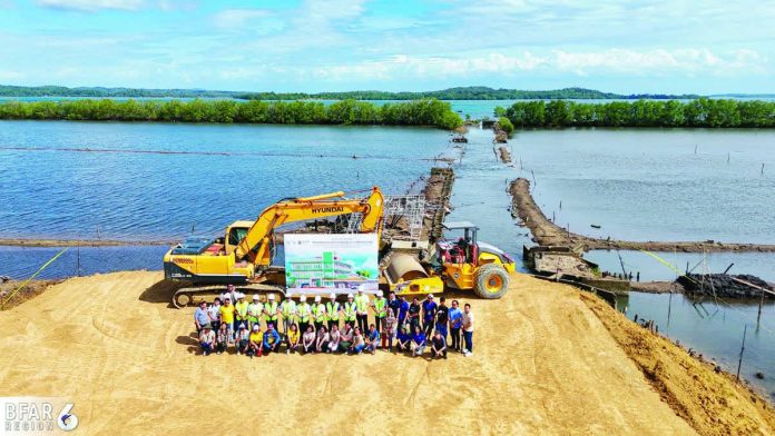 Guimaras_aquaculture_copy_resized_compressed An aerial view of the project site in Barangay Igdarapdap, Nueva Valencia, Guimaras, where construction has begun for the P500-million Guimaras Aquaculture Project, which aims to boost fisherfolk income and promote sustainable aquaculture practices in the province. BFAR-6 PHOTO