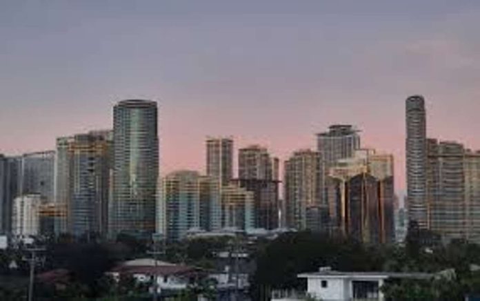 PSA_revises_resized The Philippine Statistics Authority on Jan. 28, 2026 reported a downward revision of the economy’s third-quarter 2025 growth output to 3.9 percent from the preliminary 4 percent estimate. Photo shows the Makati skyline. PNA FILE PHOTO