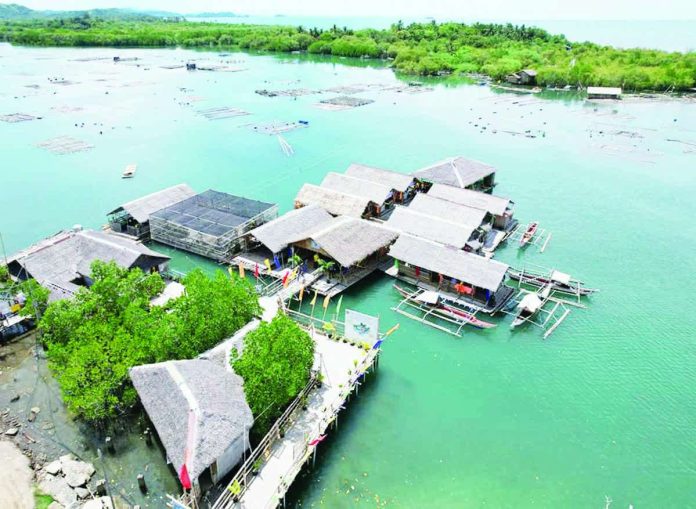 Aerial view of the Palina Greenbelt Ecopark, a key component of Roxas City’s Palina River Cruise, which won the ASEAN Sustainable Tourism Award (Urban Category). ROXAS CITY GOV’T PHOTO