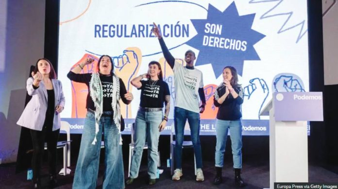 Spain Far-left party Podemos has long campaigned for undocumented migrants, under the slogan "regularization is rights". Europa Press via Getty Images