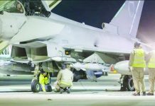 UK, France bomb underground IS arms bunker in Syria Royal Air Force ground crew prepare an RAF Typhoon fighter jet. EPA/SHUTTERSTOCK