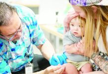 Measles cases surge in South Carolina as US risks losing elimination status A one-year-old is held by his mother while he receives an MMR vaccine at a clinic in Texas. Vaccination rates have fallen in the United States, leading to more measles outbreaks. GETTY IMAGES