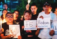 Venezuela starts releasing some American citizens from prison Rows of people hold a vigil calling for the release of prisoners in Venezuela. EPA