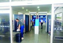 Gov. Arthur Defensor Jr. has expressed opposition to returning the initial ground-floor X-ray screening at Iloilo International Airport, noting that many airports abroad have already abandoned multiple screening stages in favor of smoother passenger flow. Right photo shows passengers undergoing the initial security screening at the airport in September 2025. The screening was later ordered removed by Transportation Secretary Giovanni Lopez to free up space for passengers. DOTR PHOTO