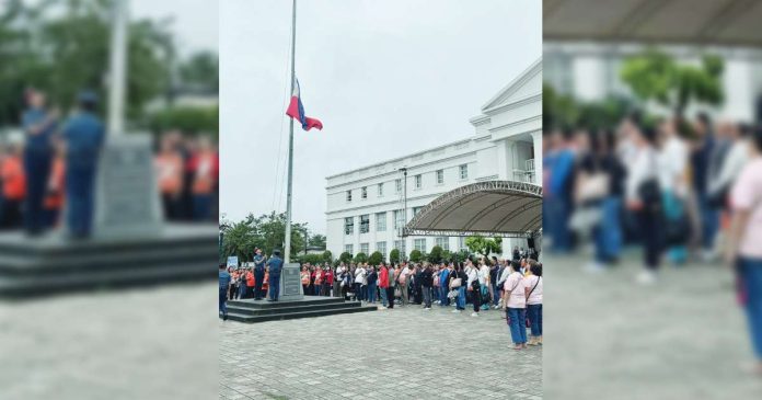Bacolod City Hall employees attend the flag-raising ceremony on January 5, 2026, where Mayor Greg Gasataya reminded personnel to strictly comply with the prescribed uniform and dress code policies. BCCO PHOTO