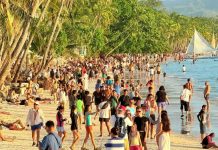 YEAR-END TOURISM BOOM: Boracay Island caps 2025 with record December surge, tops 227,000 visitors Holiday crowds gather along White Beach as tourists pack Boracay Island in December 2025. The resort island is one of the Philippines’ strongest tourism earners. RELAKS KALANG CH/FACEBOOK PHOTO