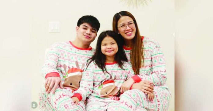 bugoy cariño copy_superimposed_compressed Bugoy Cariño (left) with his wife EJ Laure and daughter Scarlet