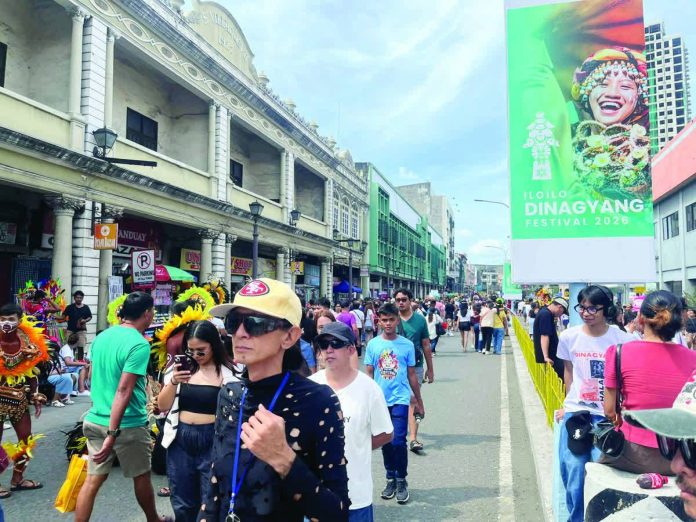 BACK TO THE HEART OF DINAGYANG. Locals and tourists pack the historic Calle Real in Iloilo City as they celebrate the final day of the Dinagyang Festival on Sunday, January 25, 2026. Following strong public clamor, the Iloilo Festivals Foundation Inc. announced that the Ati tribes competition will return to its traditional Calle Real route next year. The downtown stretch, long regarded as the heart of Dinagyang, drew dense foot traffic throughout the day, underscoring public preference for the festival’s original setting. Organizers said the 2027 edition will restore the full Dinagyang experience that generations of Ilonggos have come to expect. MAI LADIAO/PN
