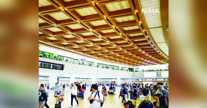 holiday passengers copy_superimposed_compressed Holiday passenger volume at the Ninoy Aquino International Airport peaked at 180,089 on January 4, 2026 – the highest single-day passenger volume recorded so far. NAIA/FACEBOOK PHOTO