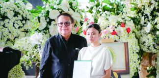 Yzabelle Annika Lamasan Padojinog, daughter of the late Vice Mayor Aimee Paz Lamasan of Dueñas, Iloilo, poses with 4th District’s Cong. Ferjenel Biron after taking her oath as new member of the Nacionalista Party. PHOTO FROM THE FACEBOOK PAGE OF LEE ANN DEBUQUE