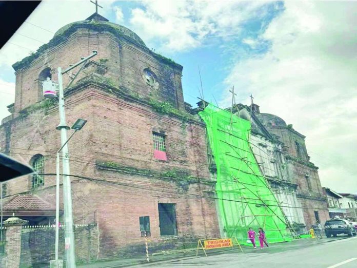 Built in 1866 and dedicated to San Nicolas de Tolentino, the church of Cabatuan, Iloilo is believed to have sustained damage possibly triggered by a series of earthquakes in recent months, which authorities say may have loosened sections of its masonry. Widening cracks on the right belfry tower are also suspected to be earthquake-related. PHOTOS OF SAN NICOLAS DE TOLENTINO CHURCH OF CABATUAN, ILOILO FROM NEREO LUJAN