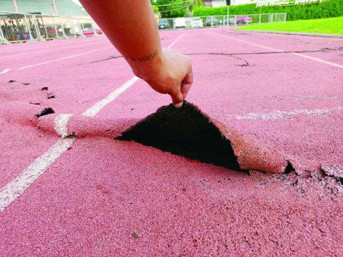 ime_oval_(1)_copy_resized_compressed WORN TRACK SURFACE. Portions of the rubberized track oval at the Iloilo Sports Complex in La Paz, Iloilo City peel off and expose the underlying surface, raising safety concerns among athletes and prompting calls for urgent repair after photos of the damage circulated on social media.