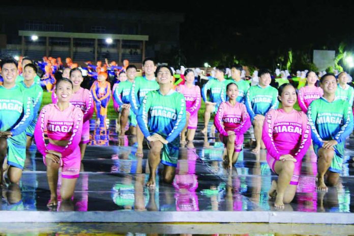 ime_paint_copy_resized_compressed Kasadyahan sa Kabanwahanan dancers keep their smiles as they perform on rain-soaked, slippery floorboards at the Iloilo Sports Complex on January 10’s opening salvo, prompting organizers to review surface safety measures ahead of Dinagyang Festival 2026. NELJOY GALIGAO/PN