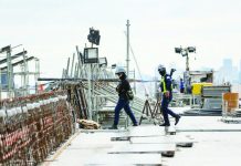 Security personnel monitor the construction site of the NLEX-SLEX Connector in this file photo. Section 1 of the eight-kilometer NLEX connector linking C3-Caloocan to España is 92 percent complete, while construction of Section 2, linking España, Manila to PUP in Sta. Mesa is 25 percent done according to Metro Pacific Investments Corporation. JONATHAN CELLONA/ABS-CBN NEWS PHOTO