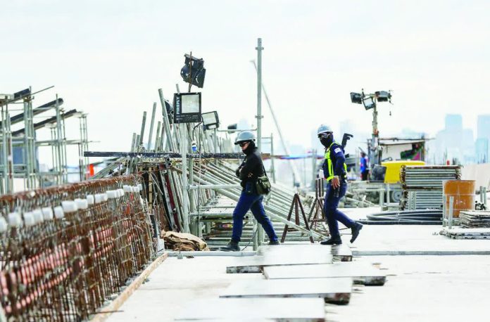 infra_spending.JPG_resized_compressed Security personnel monitor the construction site of the NLEX-SLEX Connector in this file photo. Section 1 of the eight-kilometer NLEX connector linking C3-Caloocan to España is 92 percent complete, while construction of Section 2, linking España, Manila to PUP in Sta. Mesa is 25 percent done according to Metro Pacific Investments Corporation. JONATHAN CELLONA/ABS-CBN NEWS PHOTO