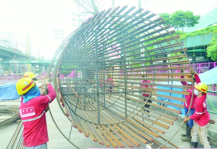 infra_spending_boost_copy_resized_compressed Metro Rail Transit-Line 7 workers assembled a rebar cage in front of SM North, Edsa Highway in Quezon City in this file photo. ANZ Research said a recovery of government infrastructure spending after a deep slump triggered by the flood control scandal would be the most effective way to accelerate growth. PNA PHOTO BY ROBERT OSWALD P. ALFILER