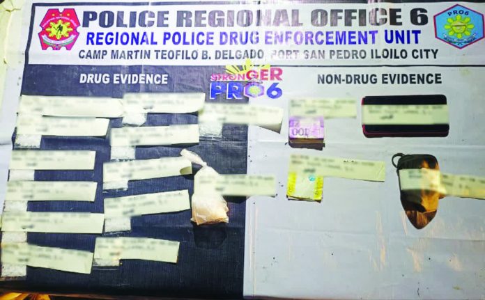 la_paz_drug_sting_resized_compressed Twelve heat-sealed plastic sachets and one knot-tied plastic bag containing suspected shabu, buy-bust money and proceeds, cellular phone, and non-drug-related items were confiscated from a high-value individual in a buy-bust operation in Barangay Ticud, La Paz, Iloilo City, on Jan. 28, 2026. RPDEU PHOTO