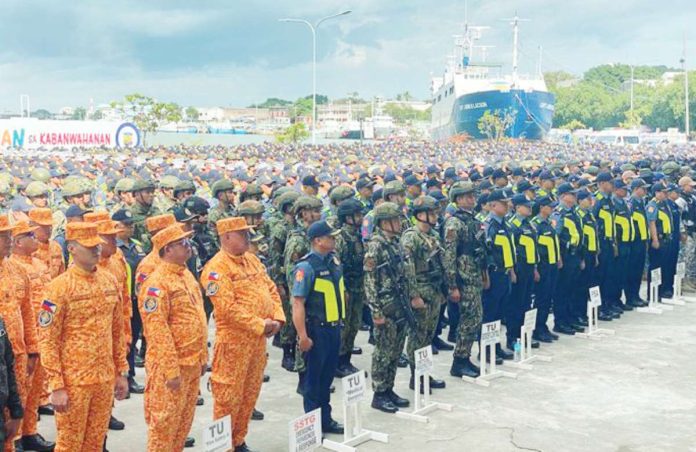 mai security1 Thousands of police officers, uniformed personnel, and force multipliers stand in formation during the send-off ceremony for the Site Task Group Dinagyang, marking the full deployment of security forces to ensure a safe, orderly, and peaceful Dinagyang Festival 2026 in Iloilo City.