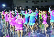 Kasadyahan contingents already in winning form, Defensor cites opening salvo performances RAIN OR SHINE SPIRIT. Despite a rain-soaked and slippery dance platform, dancers from the competing tribes push through with energy and smiles as they take part in the “Unity Dance” during the opening salvo of Kasadyahan sa Kabanwahanan at the Iloilo Sports Complex on Saturday, January 10. Heavy downpour later forced organizers to cancel the remaining performances to ensure the safety of the performers. AJ PALCULLO/PN