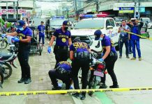 Personal feud between security guards erupts into daytime gunfire at busy Iloilo City intersection Crime scene investigators collect evidence at the corner of Delgado and Mabini streets in Iloilo City after a shooting incident involving two security guards on Monday morning, January 5, 2026. AJ Palcullo/PN