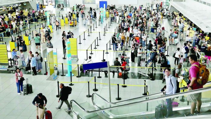 passenger_traffic_resized_compressed Global passenger traffic is expected to increase by 4.9 percent this 2026, according to the International Air Transport Association. Photo shows travelers at the Ninoy Aquino International Airport. INQUIRER FILE PHOTO