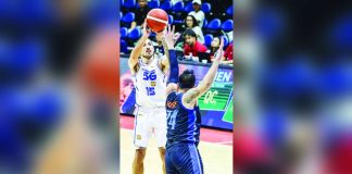 TNT Tropang 5G’s Jordan Heading rises for a jumper over the defense of Negrense Raymar Jose of Meralco Bolts during Game 5 of the PBA Philippine Cup semifinals. PBA PHOTO