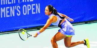 Alex Eala pumps her fist after scoring a point against Alina Charaeva. PHOTO BY PHILIPPINE WOMEN'S OPEN /PHILTA