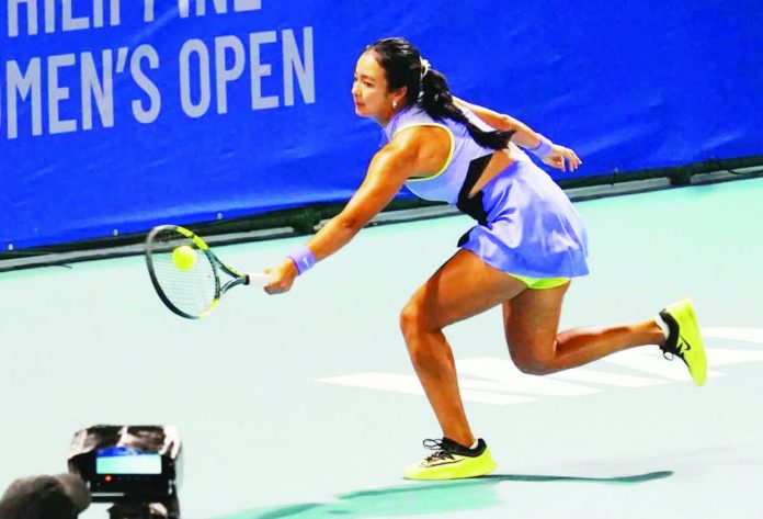sports_Alex_resized_compressed Alex Eala pumps her fist after scoring a point against Alina Charaeva. PHOTO BY PHILIPPINE WOMEN'S OPEN /PHILTA
