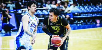 John Paul Erram dominates the paint as TNT Tropang 5G moves within one win of the PBA Philippine Cup Finals. PBA PHOTO