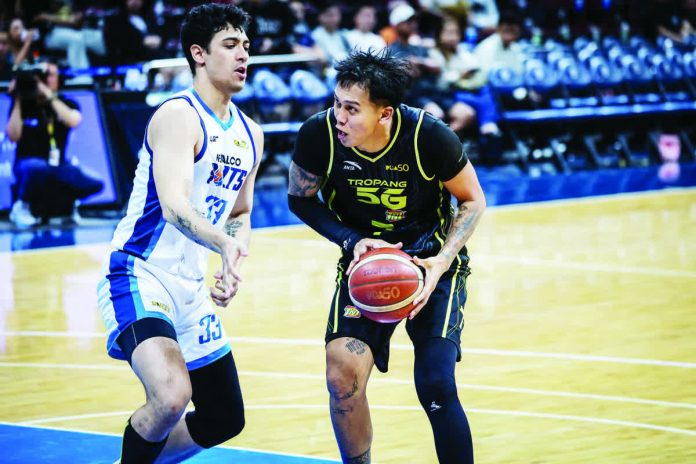 John Paul Erram dominates the paint as TNT Tropang 5G moves within one win of the PBA Philippine Cup Finals. PBA PHOTO