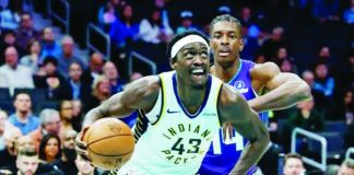 Indiana Pacers forward Paskal Siakam drives against the defense of Charlotte Hornets' Moussa Diabete. AP