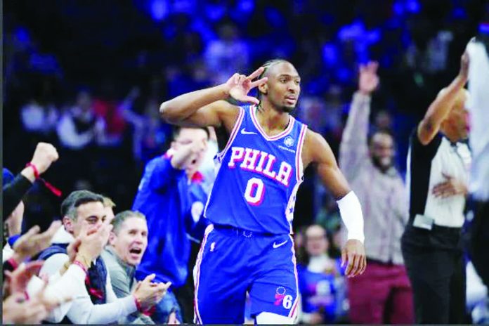 sports_Maxey_copy_resized_compressed Philadelphia 76ers guard Tyrese Maxey reacts after making a basket against Sacramento Kings. AP