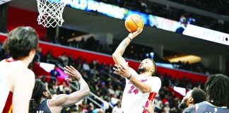 Miami Heat guard Norman Powell goes for a one-hander against the defense of Detroit Pistons; Isaiah Stewart. PHOTO COURTESY OF LON HORWEDEL/IMAGNIMAGES