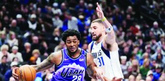 Utah Jazz’s Brice Sensabaugh attempts to attack the defense of Dallas Mavericks' Klay Thompson. AP